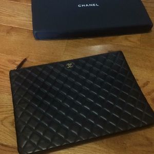 Chanel clutch black quilted black leather gold